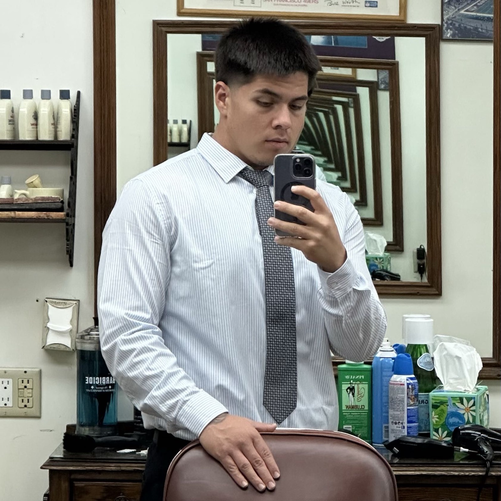 Max, barber at Millbrae Barbershop